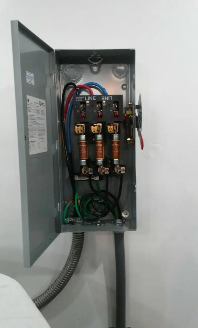 Three-phase disconnect switch installed for Smoke Detector Installation in Westchase